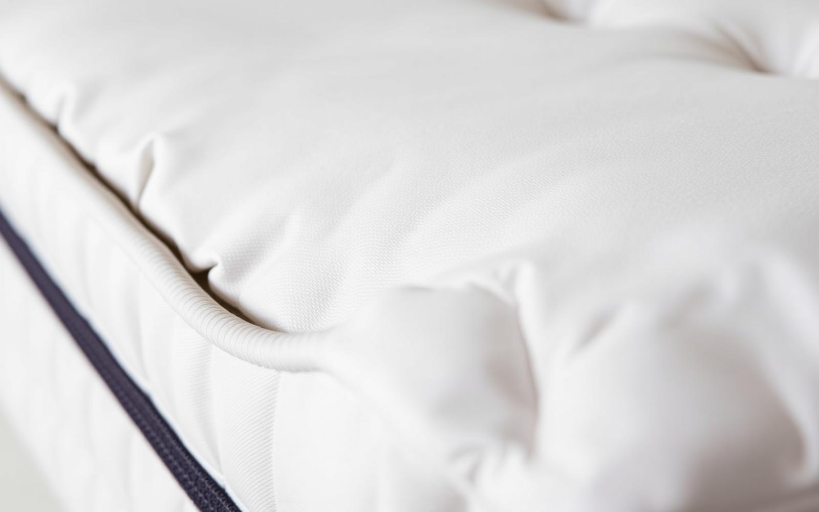 Detail of a quilted mattress edge